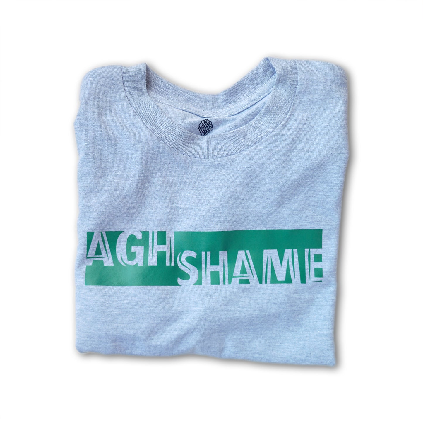 A Grey t-shirt with the phrase "Agh Shame" printed in Green.