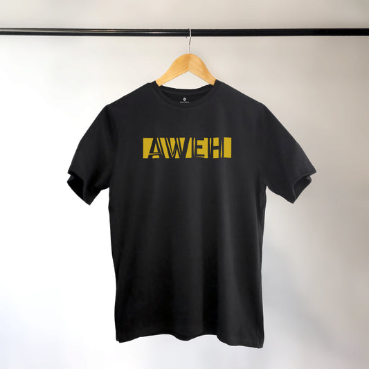 A black t-shirt with the phrase "Aweh" printed in Yellow.