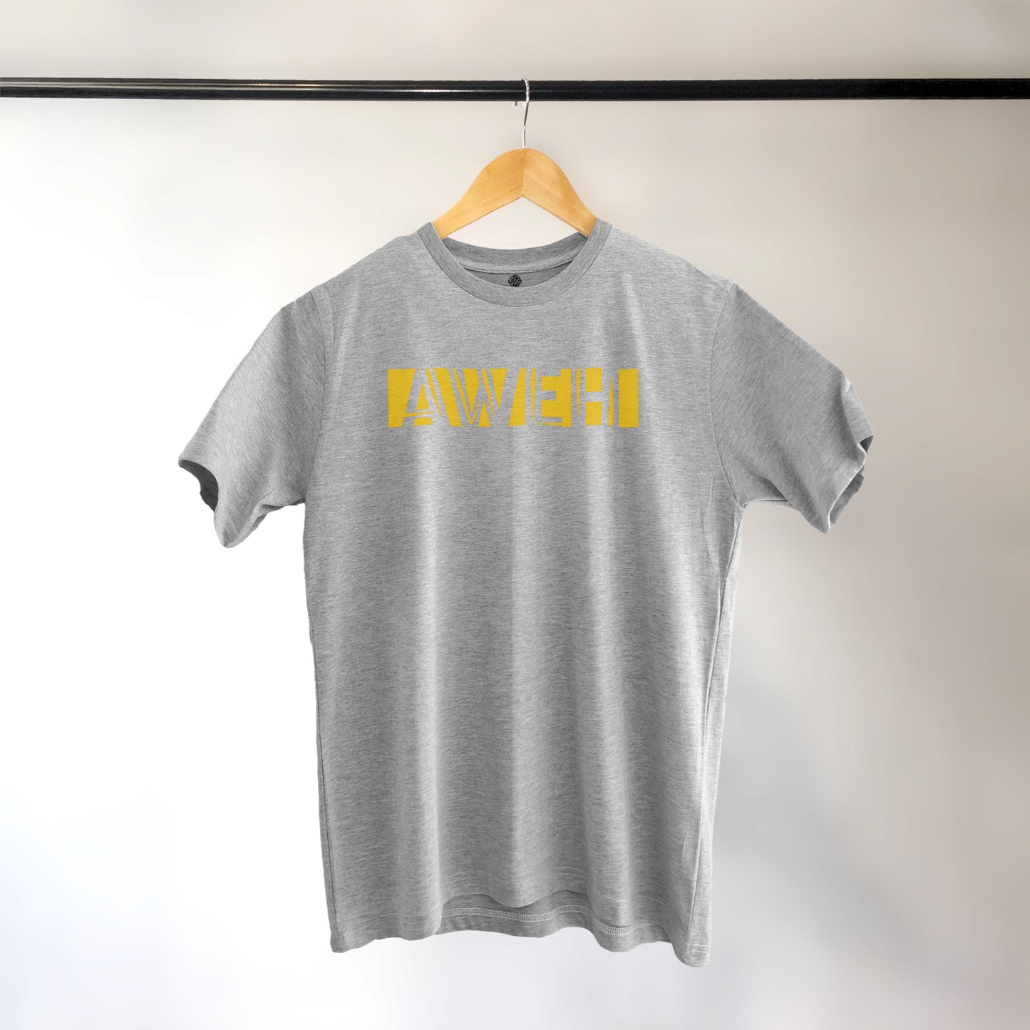 A Grey t-shirt with the phrase "Aweh" printed in Yellow.