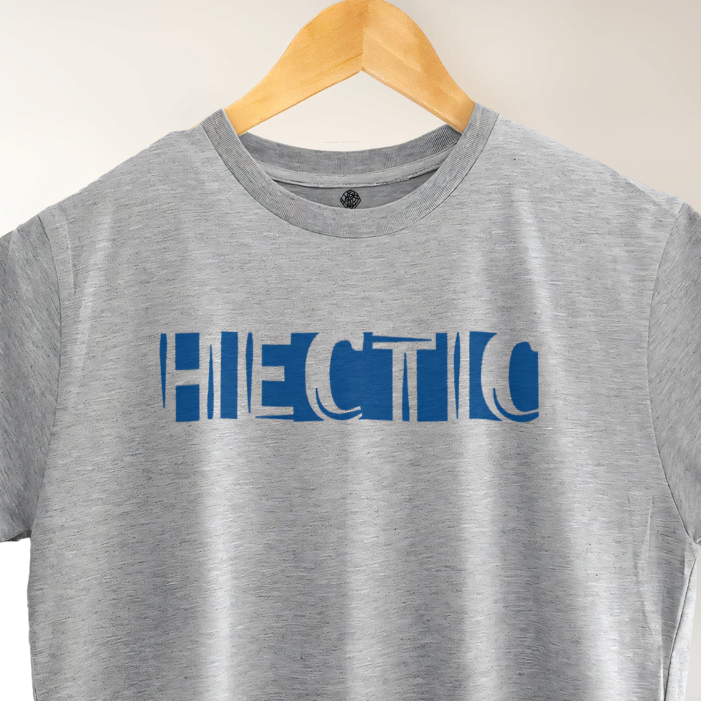 A Grey t-shirt with the phrase "Hectic" printed in Blue.