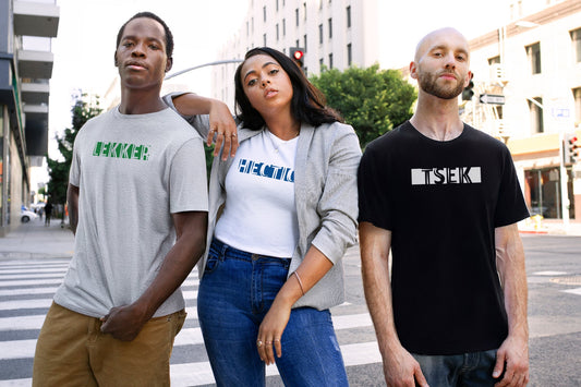 Three People Wearing Lions Roam Tees