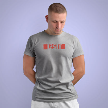 A Grey t-shirt with the phrase "Izsit" printed in Red.