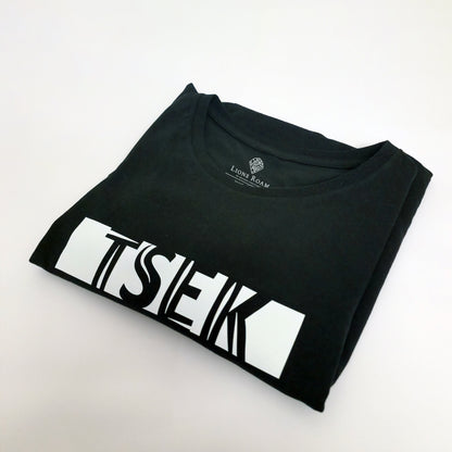 A black t-shirt with the phrase "Tsek" printed in White.