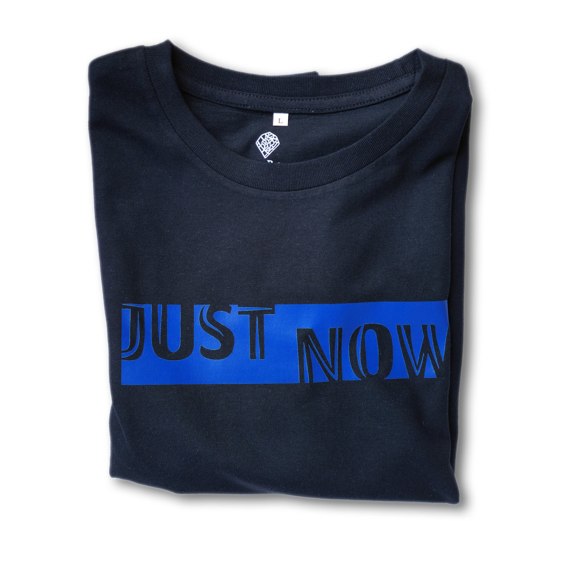 A black t-shirt with the phrase "Just Now" printed in Blue.