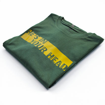 A Green t-shirt with the phrase "He's in your Head" printed in Yellow.