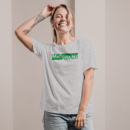 A Grey t-shirt with the phrase "Agh Shame" printed in Green.