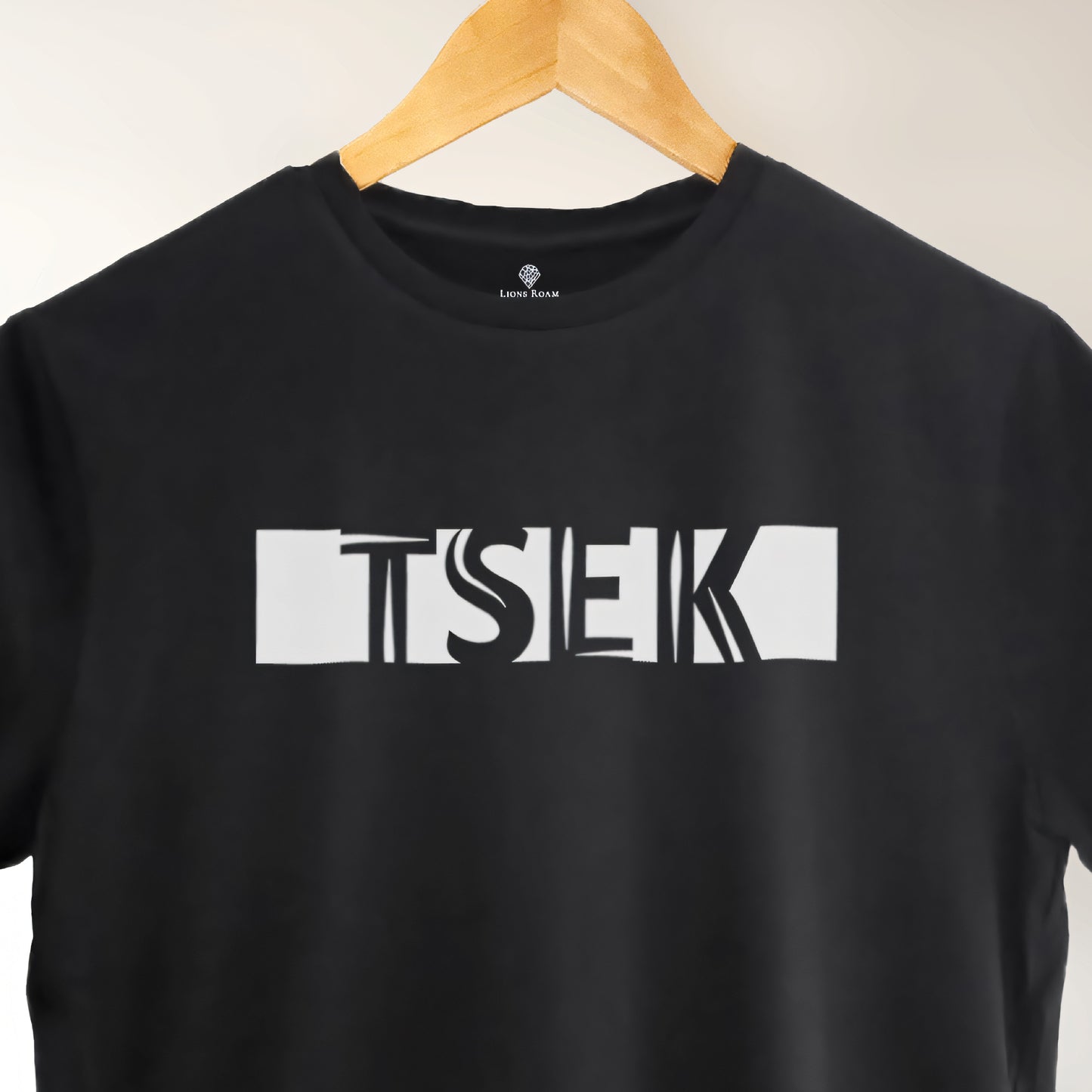 A black t-shirt with the phrase "Tsek" printed in White.