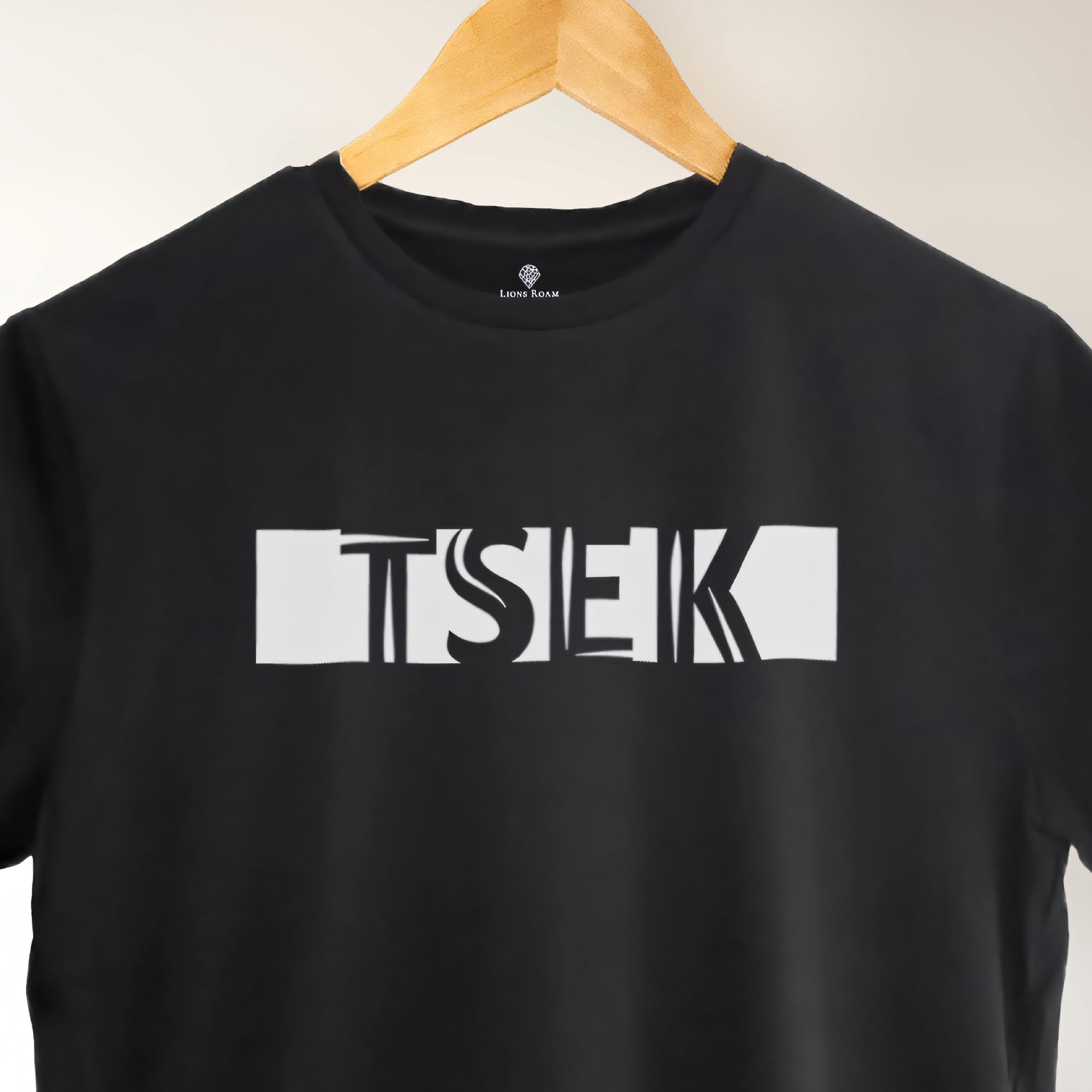 A black t-shirt with the phrase "Tsek" printed in White.