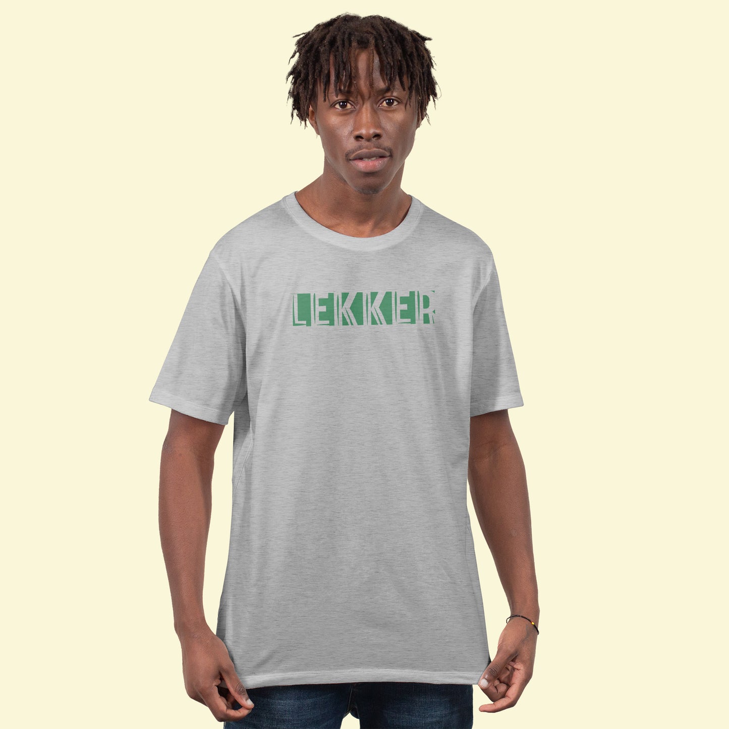 A Grey t-shirt with the phrase "Lekker" printed in Green.