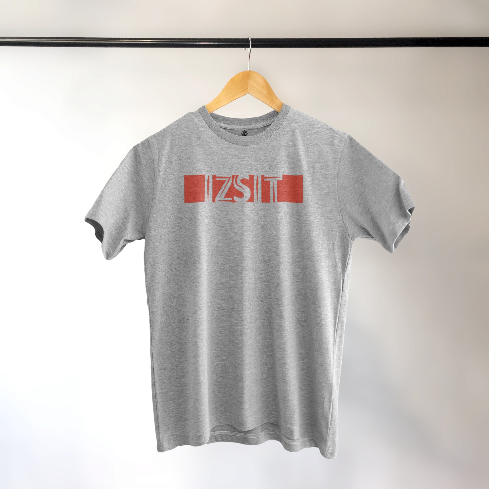 A Grey t-shirt with the phrase "Izsit" printed in Red.