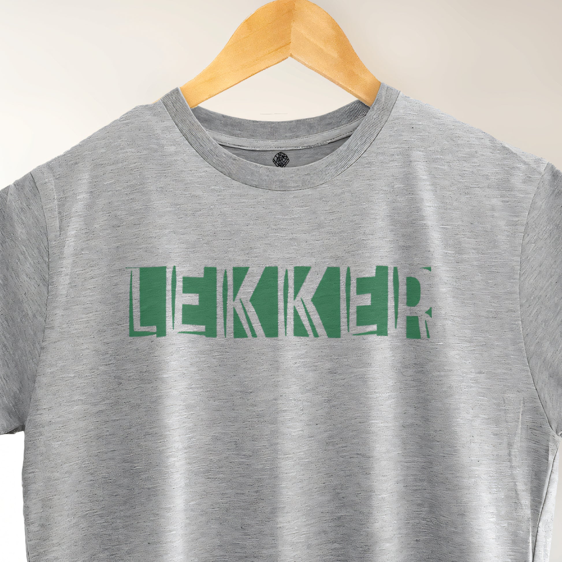 A Grey t-shirt with the phrase "Lekker" printed in Green.