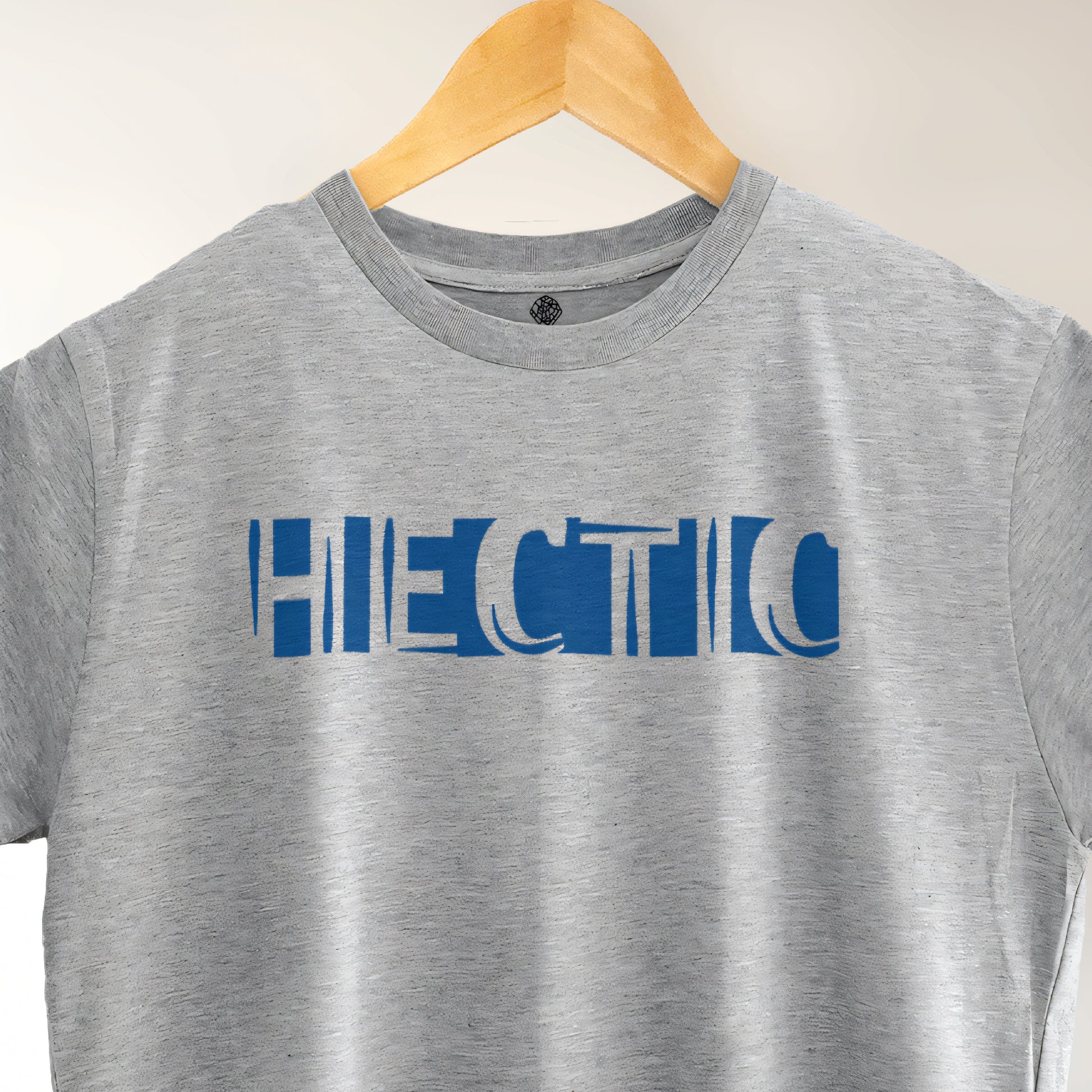A Grey t-shirt with the phrase "Hectic" printed in Blue.