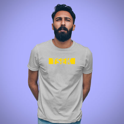 A Grey t-shirt with the phrase "Tsek" printed in Yellow.